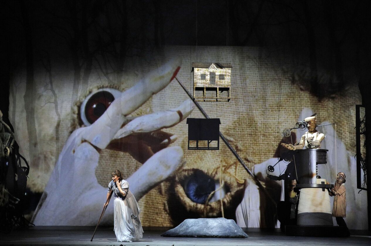 The massive, whimsical and innovative production design by<strong> John Frame</strong>, set and costume design by <strong>Vita Tzykun</strong>, lighting design by <strong>Duane Schuler</strong> and projections design by <strong>David Adam Moore</strong> s